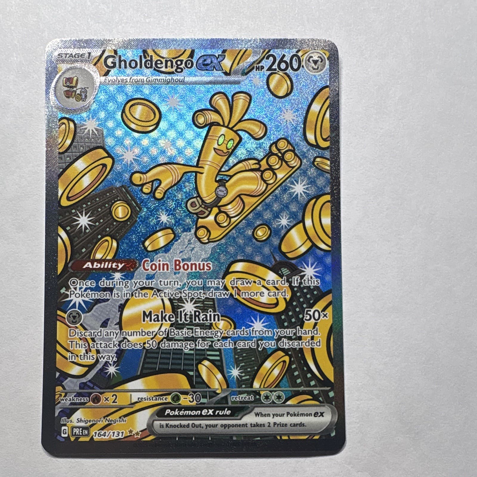 Gholdengo ex 164/131 Sv: Prismatic Evolutions Holo